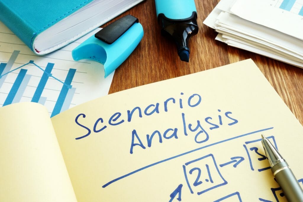 Scenario Analysis with graphs and stack of paper.