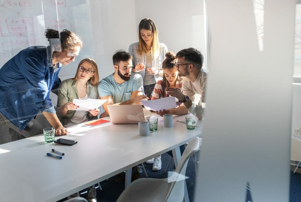 Group of casual business people in conference room.They discussi